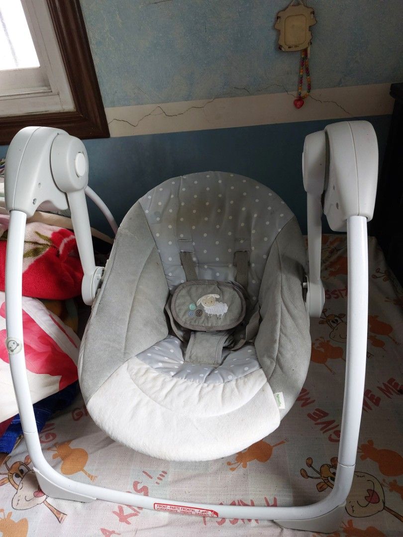 Ingenuity Soothe 'n Delight Portable Swing (Category: Cots & Cribs) located in Rizal. Submitted by Babyfume (Listing ID 1394437622, Image 3). Description: - Ingenuity Soothe 'n Delight Portable Swing - For babies 0-9 months - Multiple swing speeds - Soothing music and timer - Removable toy bar - Compact and easy to store/travel - Requires 4 C batteries (not included) -only used for 6 months -will clean and disinfect before shipping.