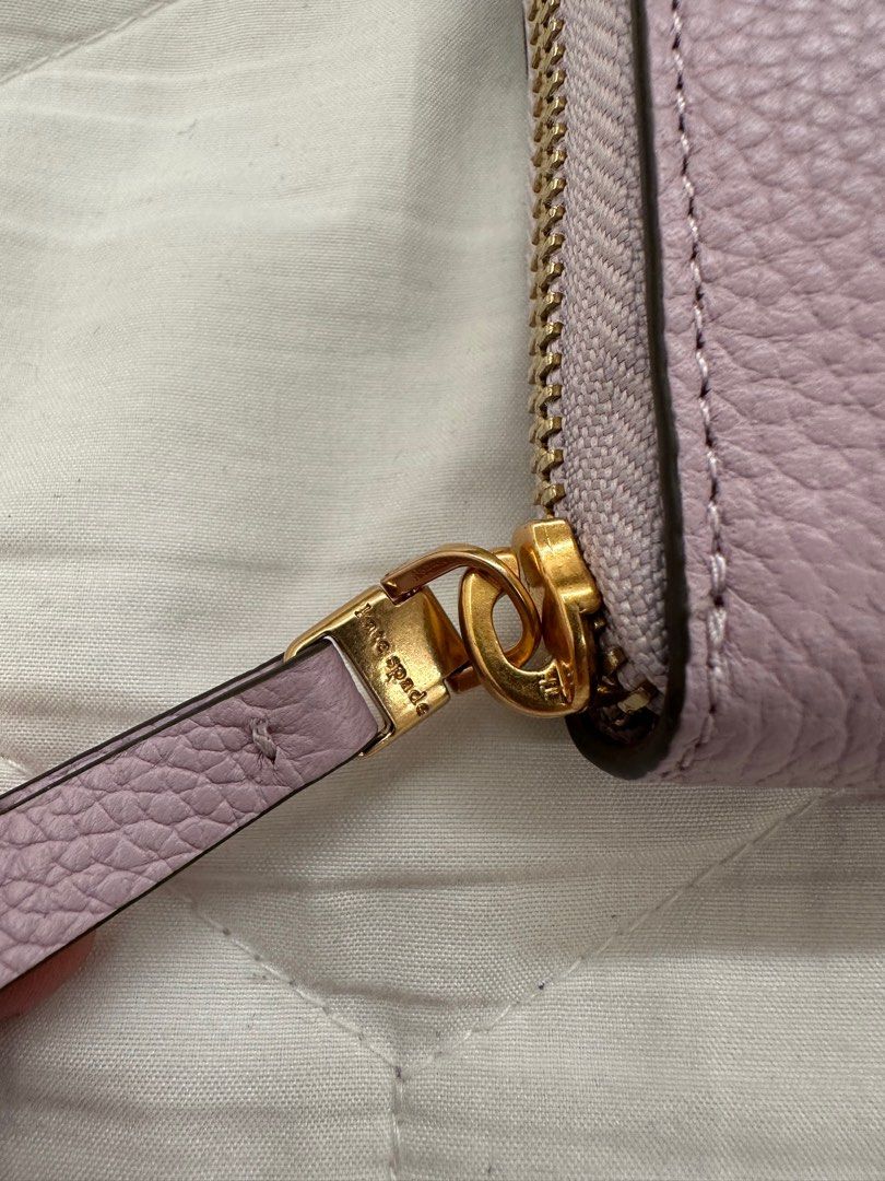 Kate Spade Pebbled Leather Wallet (Category: Luxury Bags & Wallets) located in Paranaque City. Submitted by curatedthrifty (Listing ID 1394560446, Image 3). Description: .
