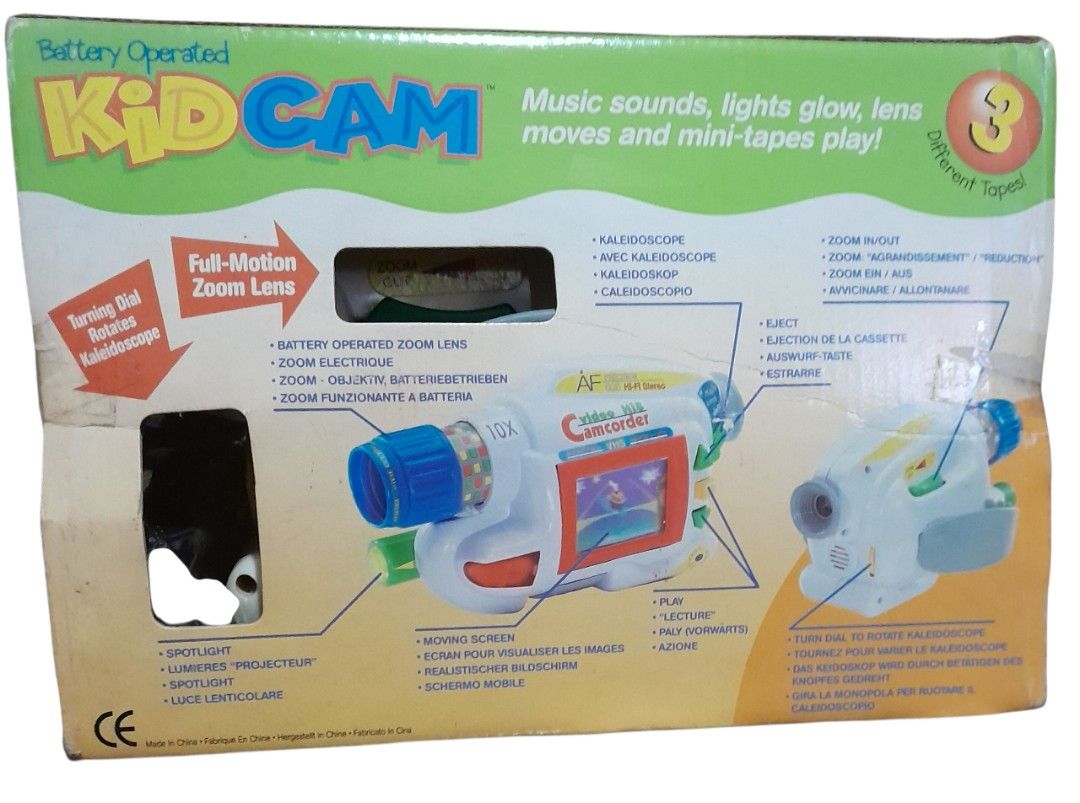 Kid Cam Video Hit Camcorder Toy (Category: Cameras) located in Mandaluyong City. Submitted by twixie94147 (Listing ID 1394489417, Image 2). Description: - Battery-operated Kid Cam camcorder toy - Full-motion zoom lens - Moving screen - Kaleidoscope function - Includes one mini-tape - Box displays features and functions - Zoom in/out capability.