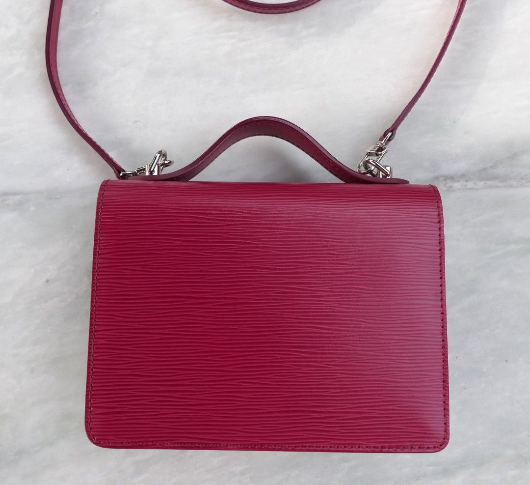 Louis Vuitton Epi Monceau (Category: Luxury Bags & Wallets) located in Candon. Submitted by curatedlux.ph (Listing ID 1394596951, Image 2). Description: - Authentic Louis Vuitton Epi Monceau - Stunning fucshia color - Top handle and detachable shoulder strap - With key.