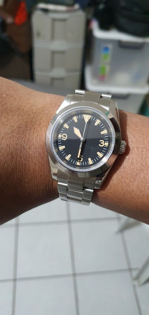 Military Watch unbranded (Category: Men's Watches) located in Lapu Lapu. Submitted by watchenthusiast4444 (Listing ID 1394430500, Image 2). Description: - Stainless steel watch - Black dial with luminous markers and hands - Stainless steel bracelet with folding clasp - Screw-down crown seiko nh34 Movement without Gmt hand and date - Minimalist design - Suitable for everyday wear 50meters water resistant 39mm diameter 11.5mm thickness.