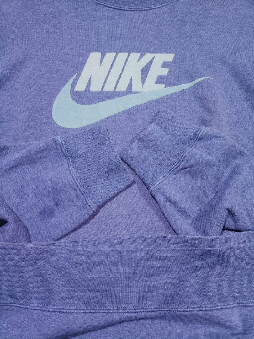 Nike Crewneck Sweatshirt - Blue (Category: Coats, Jackets and Outerwear) located in Quezon City. Submitted by selectorsthrift (Listing ID 1394561728, Image 3). Description: - Nike crewneck sweatshirt - Size: L - Color: Blue with light blue logo - Material: 100% cotton - Made in China - Manufacturing Date: 2007.