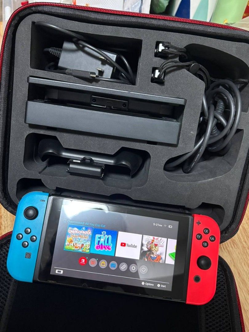 Nintendo Switch Console with Games (Category: Nintendo) located in Manila. Submitted by tonialalelilolu (Listing ID 1394476042, Image 2). Description: Nintendo Switch Console Bundle - Great Condition! PHP 12,500 Includes: • Nintendo Switch console with Neon Red & Blue Joy-Cons • Extra joystick controller • Dock, charger, and carrying case • Games included: • Marvel Super Heroes 2 • Just Dance • LEGO DC Super Villains • (See photos for more) Condi