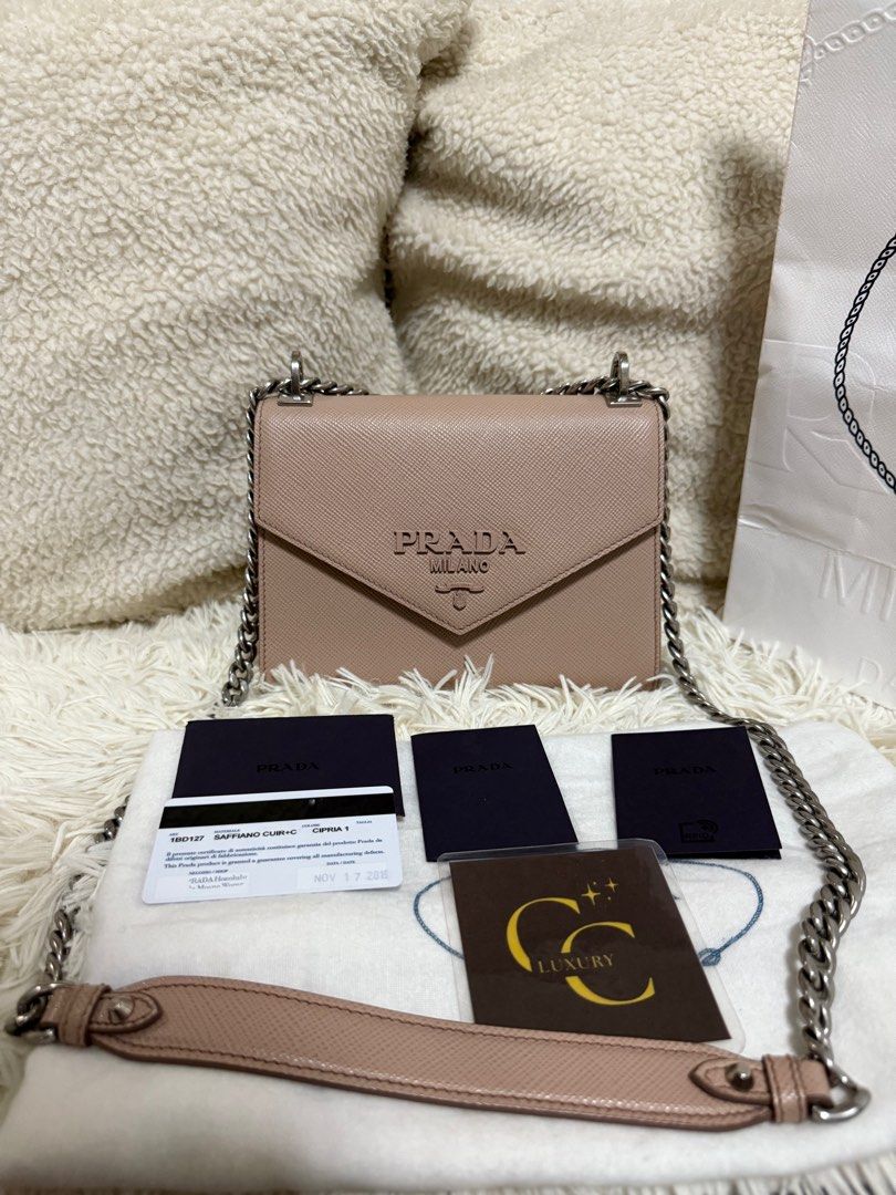 Prada Saffiano Monochrome Envelope (Category: Luxury Bags & Wallets) located in Manila. Submitted by ccluxuryy (Listing ID 1394551549, Image 2). Description: Prada Saffiano Envelope Flap Two Way Bag in Beige Pink Very good condition Comes with dust bag, authenticity card and paper bag ✨ can be worn as crossbody or shoulder bag ✨ fits iphone 16 pro max P49k only Location: Merville, Paranaque Meet up: MOA, DLSU, Newport, Greenbelt, BGC Delivery: Gr
