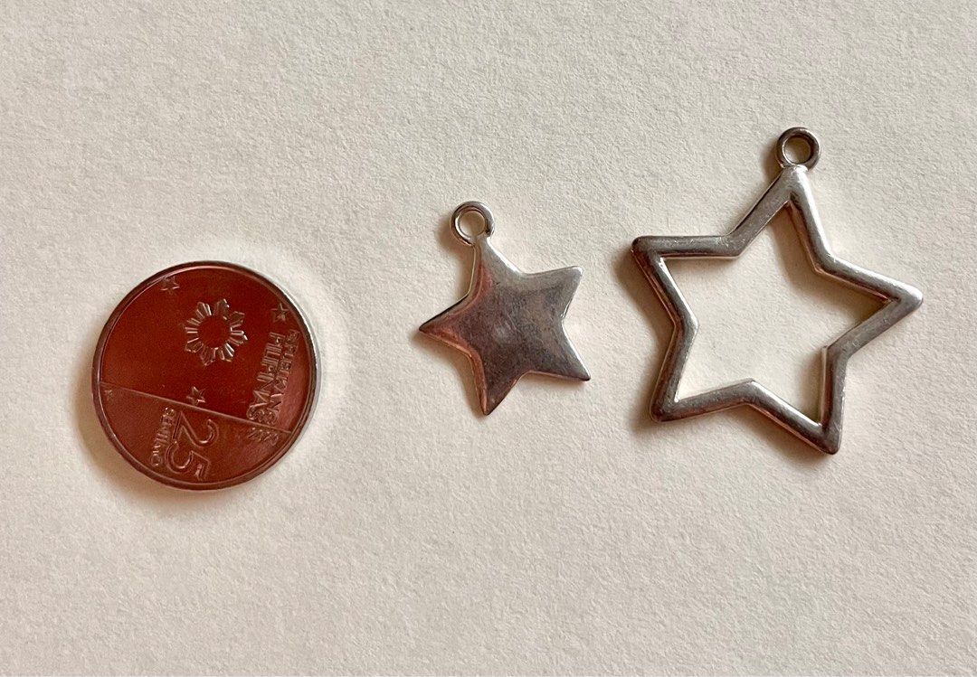 Stars charms stainless (Category: Charms) located in Muntinlupa City. Submitted by declutter_with_me (Listing ID 1394459698, Image 2). Description: Stars charms stainless.