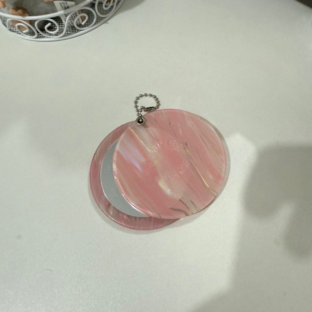 Sunnies Face Compact Mirror (Category: Makeup) located in Mandaluyong City. Submitted by cecesells_ (Listing ID 1394526403, Image 1). Description: Sticker on the mirror for covering is still intact, never used..