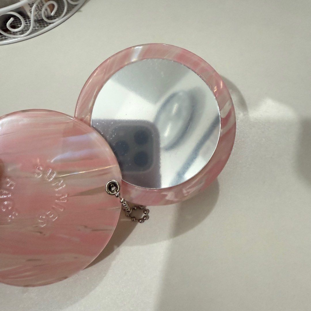 Sunnies Face Compact Mirror (Category: Makeup) located in Mandaluyong City. Submitted by cecesells_ (Listing ID 1394526403, Image 2). Description: Sticker on the mirror for covering is still intact, never used..