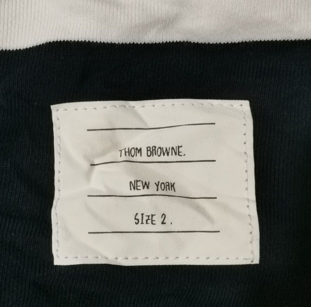 Thom Browne Navy Shorts with White Stripes (Category: Luxury Apparel) located in San Carlos City. Submitted by heverlim (Listing ID 1394438694, Image 3). Description: Thom browne navy shorts 30-34 waist, 21 length Brand new condition 400 + sf.
