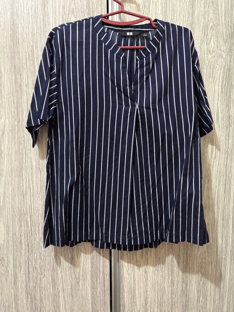 Uniqlo navy blue striped blouse (Category: Blouses) located in Cavite. Submitted by thewatchph (Listing ID 1394474248, Image 1). Description: -DECLUTTERING- Size: small Brand: Uniqlo NO WHEN WORN PHOTOS .