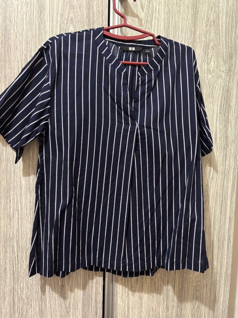 Uniqlo navy blue striped blouse (Category: Blouses) located in Cavite. Submitted by thewatchph (Listing ID 1394474248, Image 2). Description: -DECLUTTERING- Size: small Brand: Uniqlo NO WHEN WORN PHOTOS .