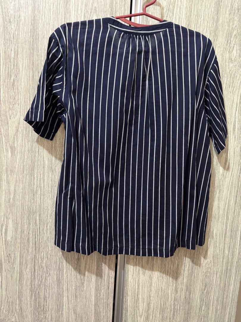 Uniqlo navy blue striped blouse (Category: Blouses) located in Cavite. Submitted by thewatchph (Listing ID 1394474248, Image 3). Description: -DECLUTTERING- Size: small Brand: Uniqlo NO WHEN WORN PHOTOS .