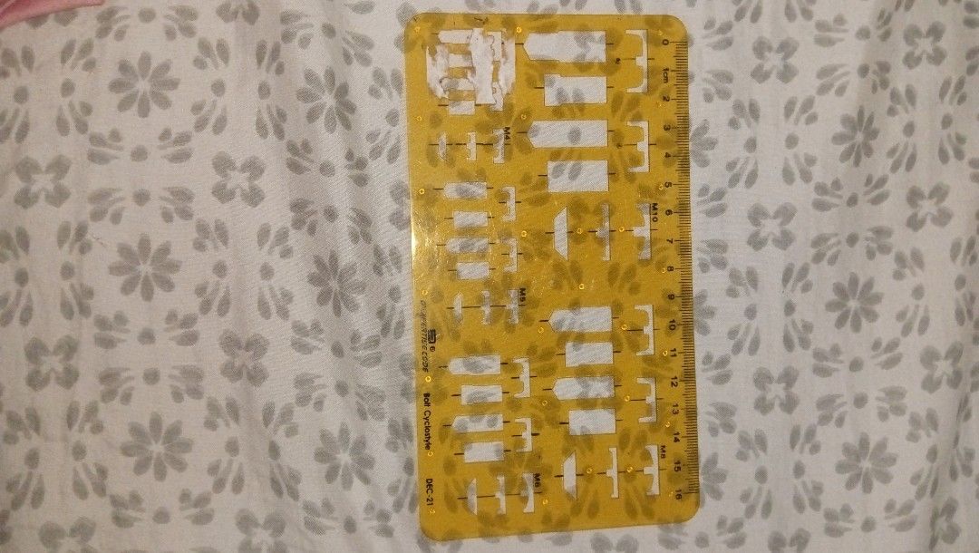 Yellow Bolt Ruler Dec-21 Cyclostyle/Template (Category: Craft Supplies & Tools) located in Makati City. Submitted by rbbql (Listing ID 1394559425, Image 1). Description: (check my other listings for set of drafting materials) - Yellow stencil ruler with diverse shapes and sizes. - Features a ruler for accurate measurements. - Made of durable, transparent material. - Allows for easy alignment and visibility. - Perfect for artists, designers, archi