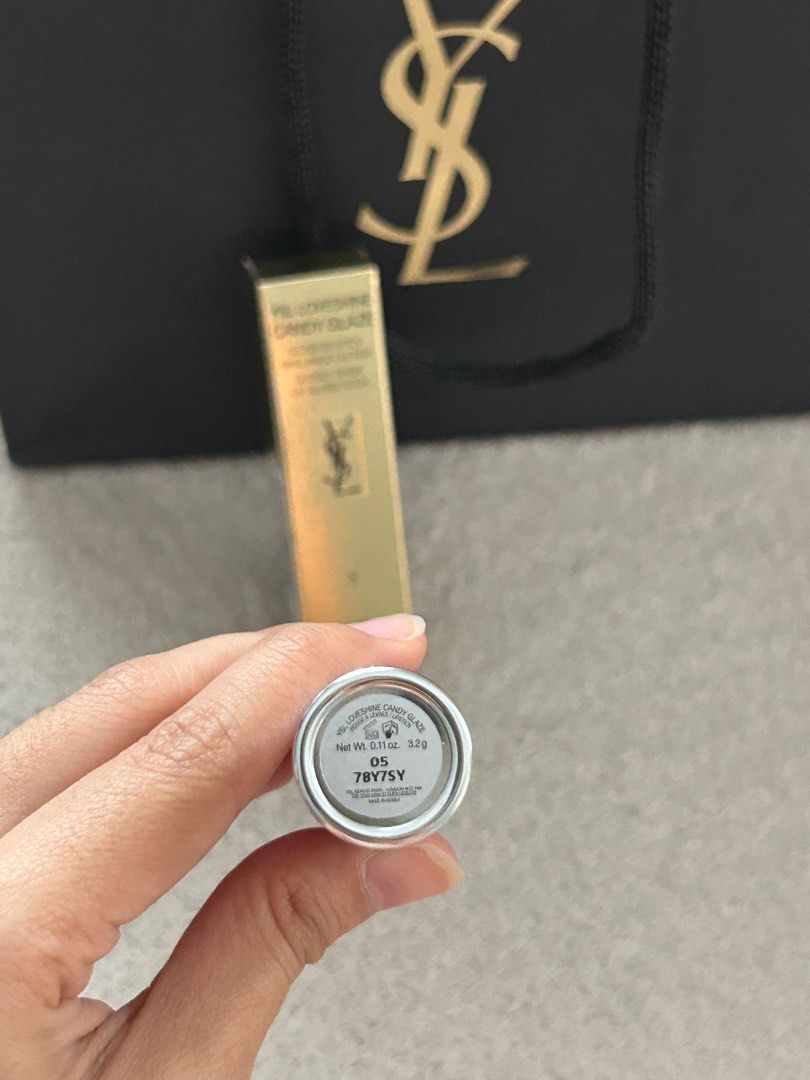 YSL Loveshine Candy Glaze Lipstick 05 (Category: Makeup) located in Quezon City. Submitted by ijadee (Listing ID 1394538518, Image 2). Description: BRANDNEW YSL Loveshine Candy Glaze Lipstick Shade: 05 | Comes with paperbag and original box .