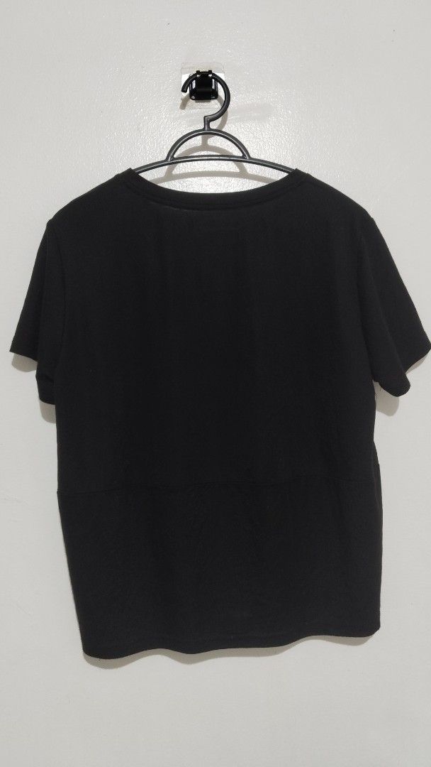 Yves Saint Laurent Box Type T-shirt (Category: Shirts) located in Manila. Submitted by kyabhe (Listing ID 1394558360, Image 3). Description: - Yves Saint Laurent T-shirt - Color: Black - Fit: Boxy - Features a small logo - Measurements: - Height: 22 inches - Width: 21 inches - Short sleeves.