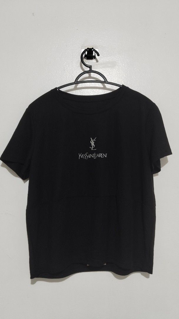 Yves Saint Laurent Box Type T-shirt (Category: Shirts) located in Manila. Submitted by kyabhe (Listing ID 1394558360, Image 2). Description: - Yves Saint Laurent T-shirt - Color: Black - Fit: Boxy - Features a small logo - Measurements: - Height: 22 inches - Width: 21 inches - Short sleeves.