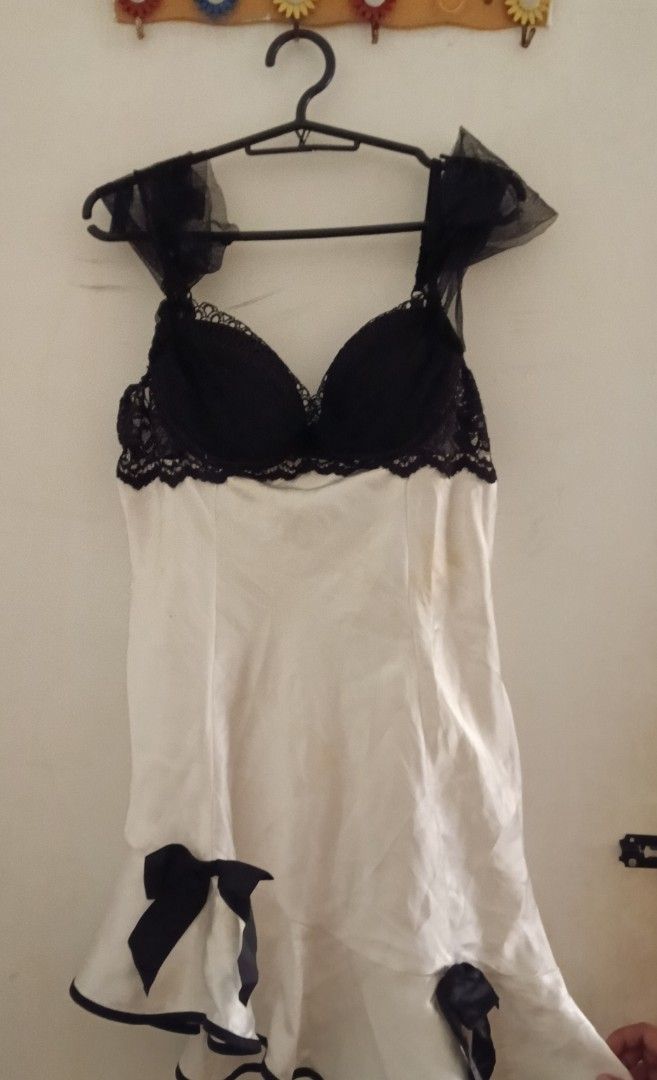 Black and White Dress (Category: Dresses) located in Bulacan. Submitted by fadeea412 (Listing ID 1394672866, Image 3). Description: - Black lace-trimmed bra top - Delicate tulle straps - White satin fabric - Black bow accents - Feminine design.