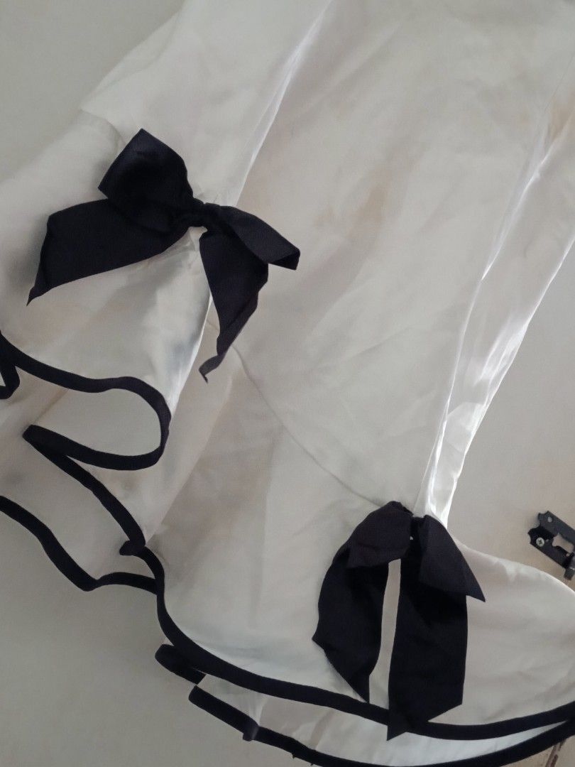 Black and White Dress (Category: Dresses) located in Bulacan. Submitted by fadeea412 (Listing ID 1394672866, Image 2). Description: - Black lace-trimmed bra top - Delicate tulle straps - White satin fabric - Black bow accents - Feminine design.