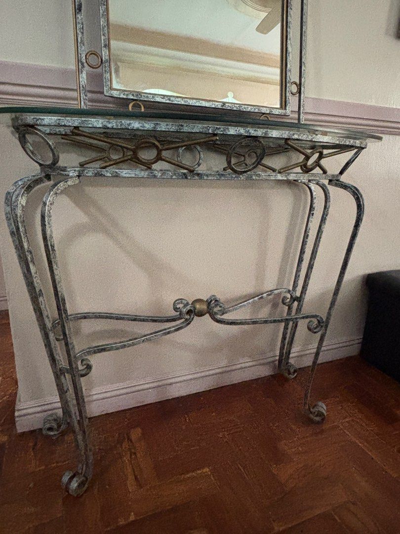 Console table with mirror (bulky) (Category: Other Home Furniture) located in San Fernando. Submitted by trigo91 (Listing ID 1394627432, Image 2). Description: Console table Material: metal, removable glass top Dimensions: L90.5cm x W39cm x H82.5cm Mirror Material: metal frame, glass Dimensions: L60cm x W2.5cm x H82.5cm Item is in San Fernando Pampanga. Buyer to arrange shipping. .