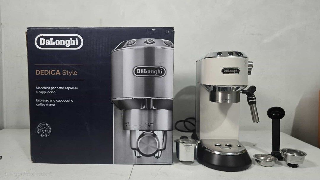Delonghi Dedica Espresso Machine (Category: Coffee Machines & Makers) located in Taytay. Submitted by mikz_1303 (Listing ID 1394647339, Image 1). Description: Delonghi Dedica Espresso Machine Australia mall pull out Used as demo or display unit No issue 220V Inclusion Box 2 Filter cup Portafilter Milk Jug Spoon and tamper 9.5k.