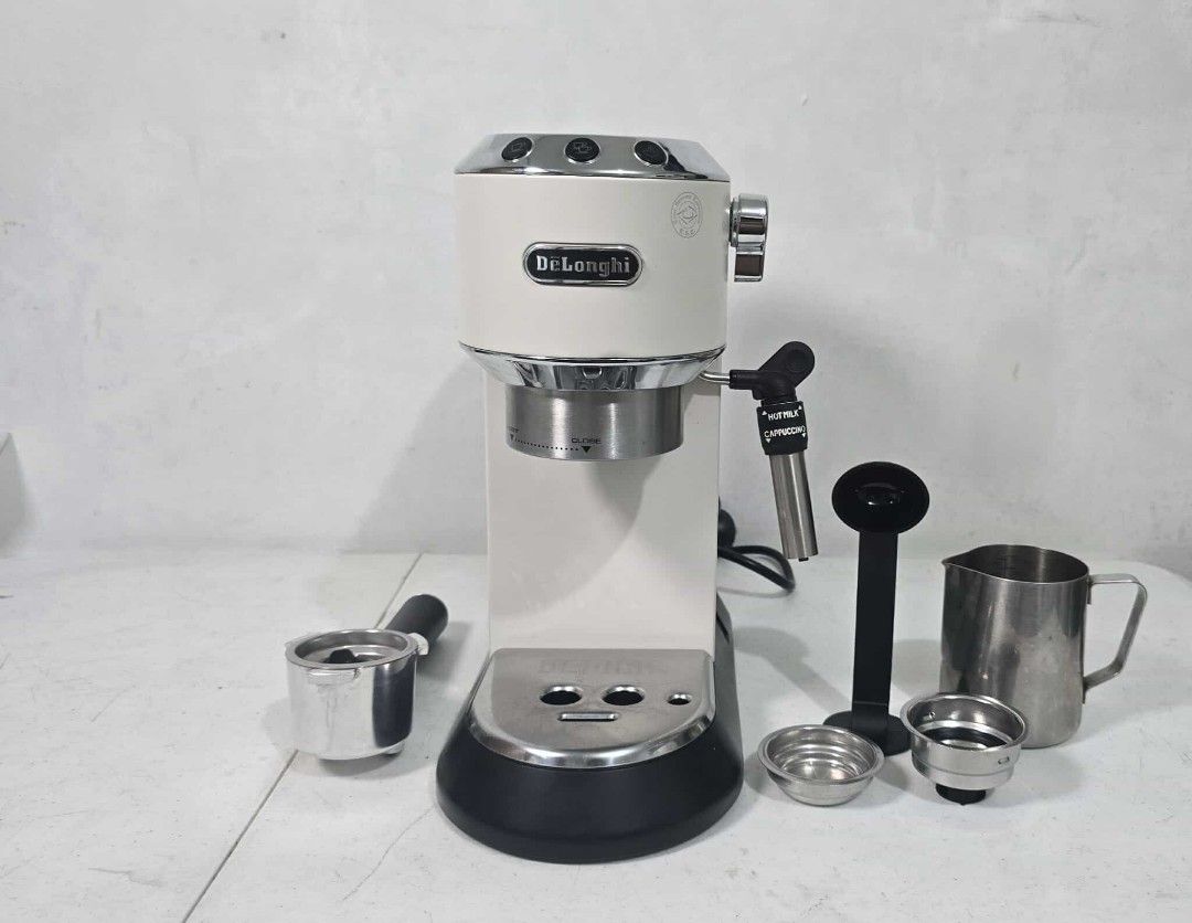 Delonghi Dedica Espresso Machine (Category: Coffee Machines & Makers) located in Taytay. Submitted by mikz_1303 (Listing ID 1394647339, Image 2). Description: Delonghi Dedica Espresso Machine Australia mall pull out Used as demo or display unit No issue 220V Inclusion Box 2 Filter cup Portafilter Milk Jug Spoon and tamper 9.5k.