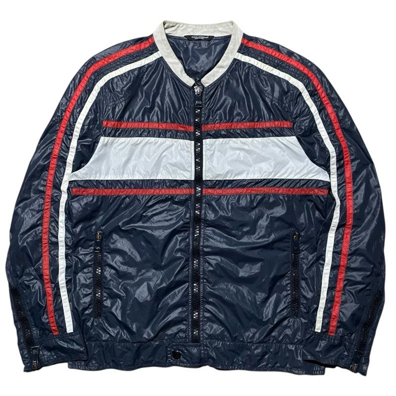 Dolce & Gabbana Nylon Biker Jacket (Category: Luxury Apparel) located in Bacolod City. Submitted by classy.glamour (Listing ID 1394712735, Image 1). Description: Dolce & Gabbana Nylon Biker Jacket Size: Medium to Large Conditon: Very good Flaw: Burnhole inside lining and scratch .