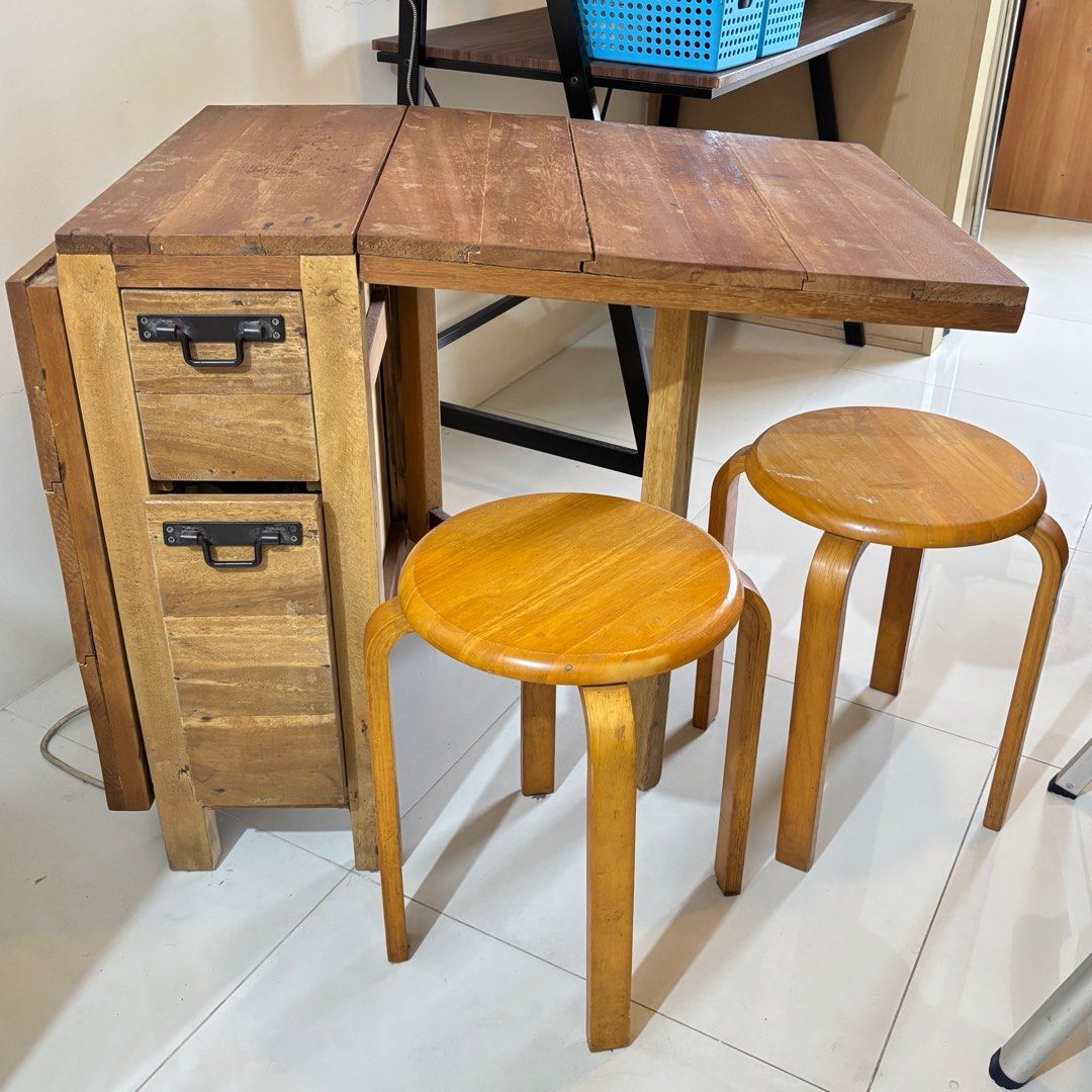Foldable Rustic Wooden Table (Category: Tables & Sets) located in Paranaque City. Submitted by _mrs.j (Listing ID 1394674958, Image 1). Description: Great as coffee table or dining table for condo Seats 4-6 people Stools not included Dimensions: One side open L=87cm W=60cm H=73.7cm Both side open L=147cm W=60cm H=73.7cm RFS: New tenant requested to remove from unit.
