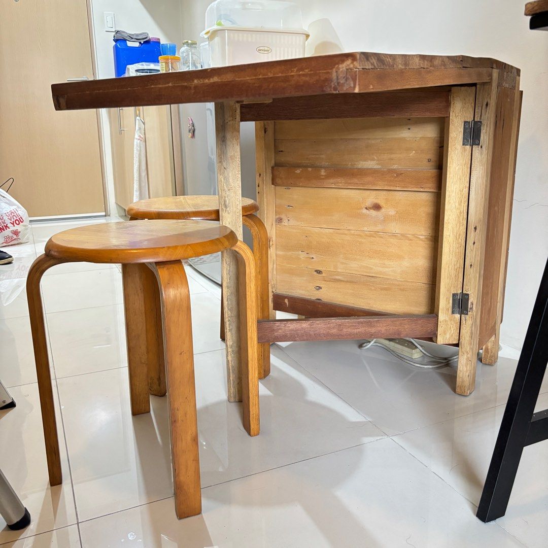 Foldable Rustic Wooden Table (Category: Tables & Sets) located in Paranaque City. Submitted by _mrs.j (Listing ID 1394674958, Image 2). Description: Great as coffee table or dining table for condo Seats 4-6 people Stools not included Dimensions: One side open L=87cm W=60cm H=73.7cm Both side open L=147cm W=60cm H=73.7cm RFS: New tenant requested to remove from unit.