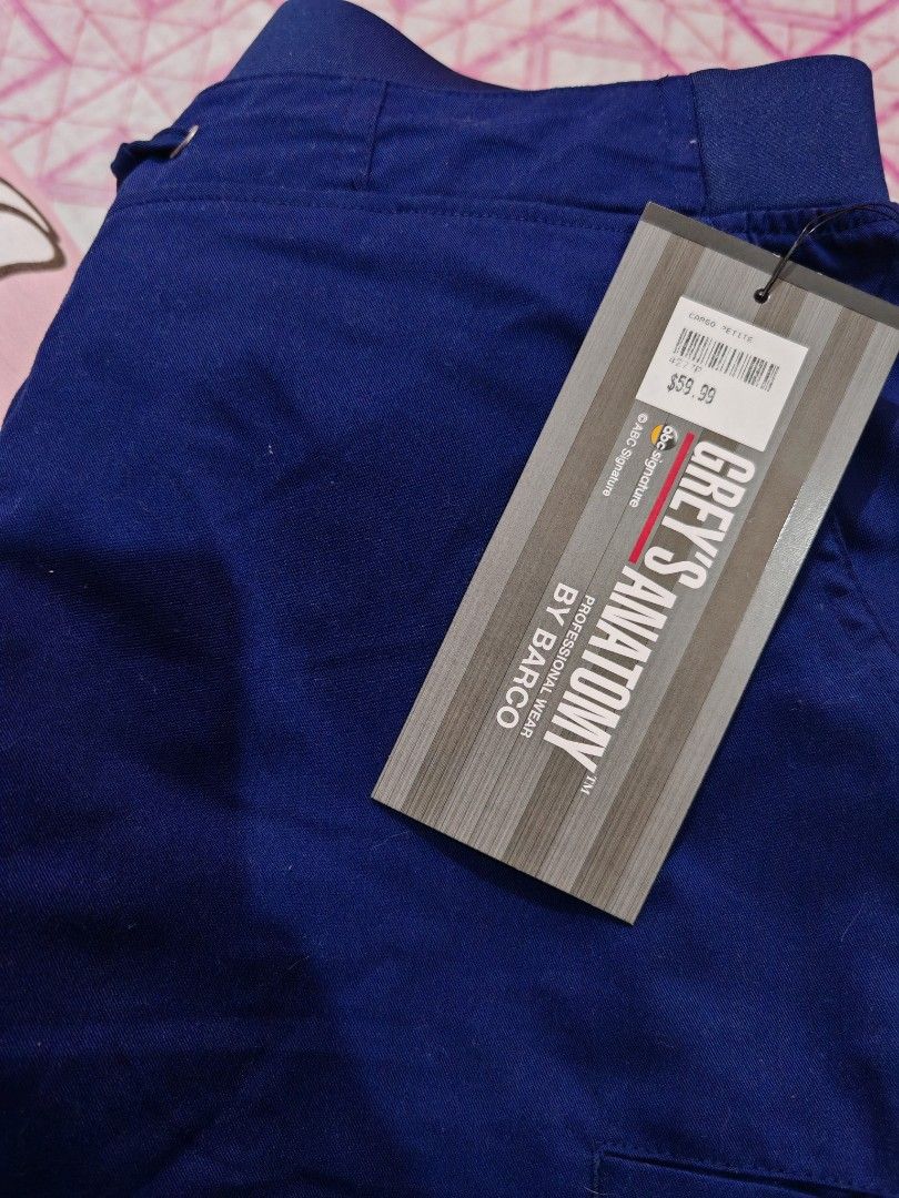 Grey's Anatomy Active Scrub Set XS (Category: Activewear) located in Manila. Submitted by esjay1122 (Listing ID 1394711693, Image 2). Description: - Grey's Anatomy Active scrub set - Color: Navy blue - Size: XS - Style: V-neck top and pants - Brand new with original tags - Brand: Barco from canada brand new with price tag.
