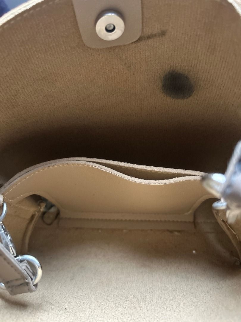 GVN The Label Multi Micro Bag in Taupe (Category: Luxury Bags & Wallets) located in Manila. Submitted by dream2doubt (Listing ID 1394696953, Image 3). Description: hard to let go! phase out product/not available in website anymore - comes with 2 extra straps (see last photo) - very spacious, has 3 compartments inside - can be worn 2 ways (handbag and sling - both are adjustable) - has a stain inside (see pictures) rfs: decluttering.