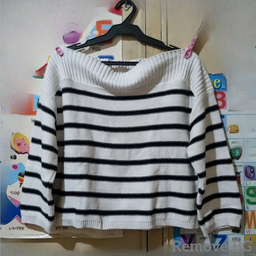 H&M Divided Striped Sweater (Category: Longsleeves) located in Quezon City. Submitted by stylemd (Listing ID 1394609893, Image 1). Description: - H&M Divided sweater - Classic black and white stripes - Boat neck, can be off shoulder - Thick knit - Long sleeves - Size: L - Material: Cotton/Acrylic blend - Stylish and versatile.