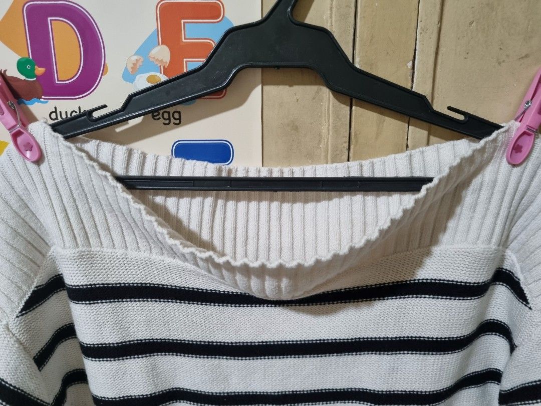 H&M Divided Striped Sweater (Category: Longsleeves) located in Quezon City. Submitted by stylemd (Listing ID 1394609893, Image 3). Description: - H&M Divided sweater - Classic black and white stripes - Boat neck, can be off shoulder - Thick knit - Long sleeves - Size: L - Material: Cotton/Acrylic blend - Stylish and versatile.