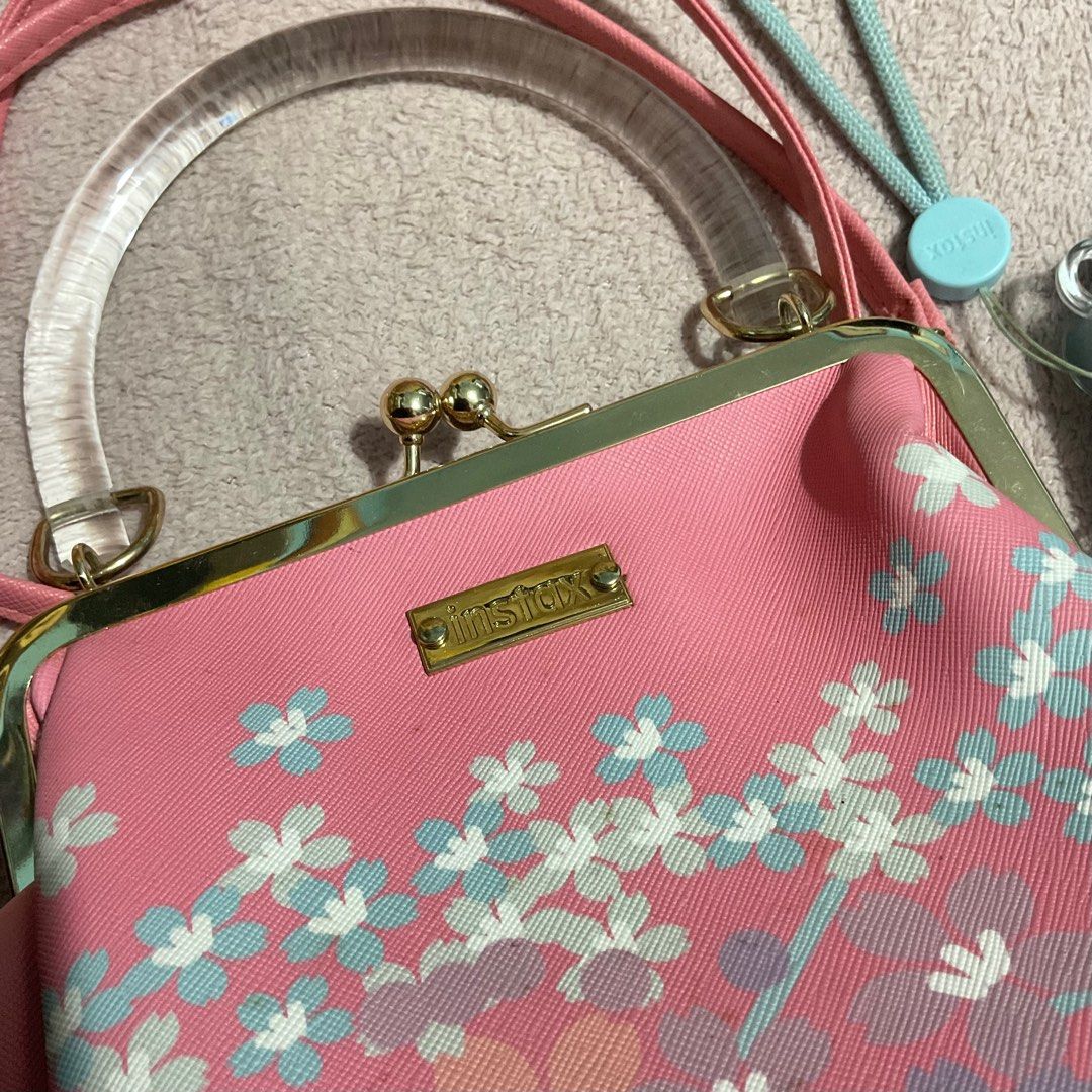 Instax Mini 11 (w/ Sakura bag for free) (Category: Cameras) located in Asingan. Submitted by dine0348 (Listing ID 1394680798, Image 3). Description: RFS: upgrade No issue Inclusions: - camera - sakura instax bag - clear case - hand strap No box..