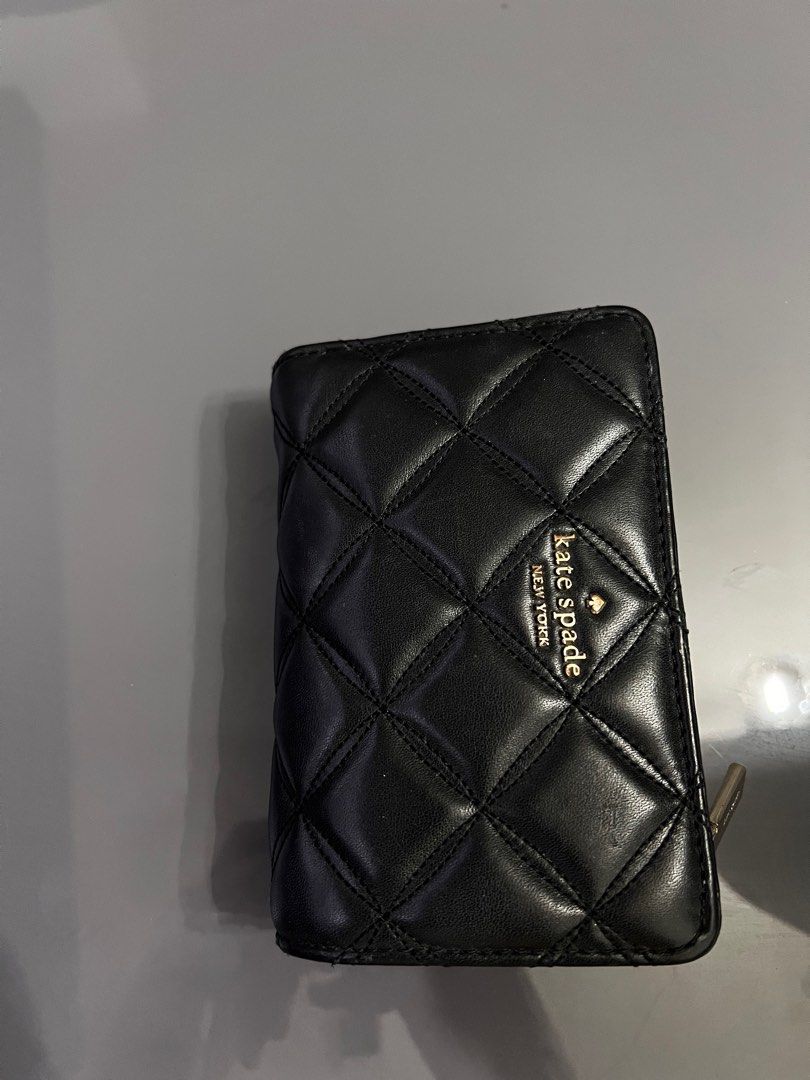 AUTHENTIC Kate Spade Bi Fold Wallet (Category: Luxury Bags & Wallets) located in Quezon City. Submitted by djamamama (Listing ID 1394776350, Image 1). Description: BiFold Minimal Flaws Rfs - I prefer a smaller wallet.