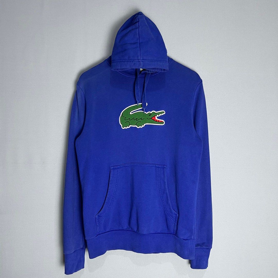 LACOSTE Blue Big Logo Hoodie | Authentic (Category: Hoodies) located in Marawi City. Submitted by lazythrifter (Listing ID 1394735817, Image 1). Description: PLS CHECK PHOTOS‼️ Size on tag: Small Width: 21 (inch) Length: 28 (inch) - Condition: 9.5/10 Color rate: 9.5/10.