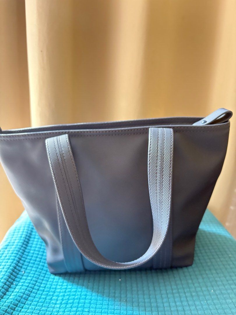Lacoste Mini Tote Bag (Category: Tote Bags) located in Cagayan de Oro. Submitted by authenticstuffsdecluttering (Listing ID 1394658279, Image 2). Description: See last photo for the flaws .