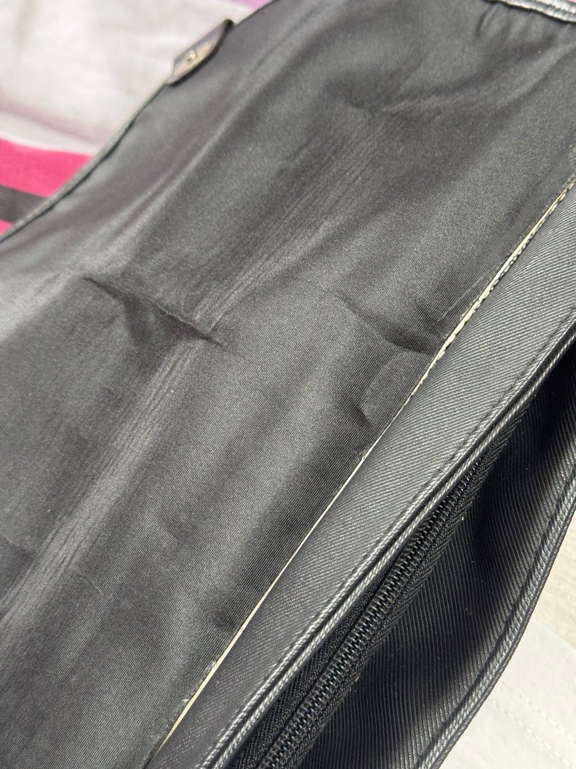MCJIM Black Crossbody Messenger Bag (Category: Cross-body Bags) located in Manila. Submitted by beatrice777 (Listing ID 1394659259, Image 3). Description: Original Price: ₱1,500 No other issues except sa flap ng bag (see listed pictures).