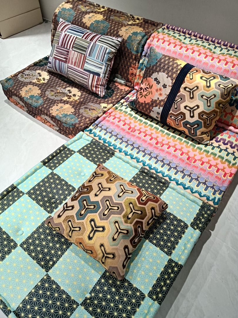 Modular Floor Sofa Couch Set with Pillows (Category: Sofas) located in Quezon City. Submitted by cholale (Listing ID 1394631205, Image 2). Description: - Unique patchwork design - Includes base, backrest, and 3 decorative pillows - Modular design for flexible arrangement - Quilted fabric for comfort - Perfect for lounging and watching TV - Kid friendly.