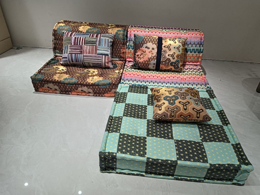 Modular Floor Sofa Couch Set with Pillows (Category: Sofas) located in Quezon City. Submitted by cholale (Listing ID 1394631205, Image 1). Description: - Unique patchwork design - Includes base, backrest, and 3 decorative pillows - Modular design for flexible arrangement - Quilted fabric for comfort - Perfect for lounging and watching TV - Kid friendly.