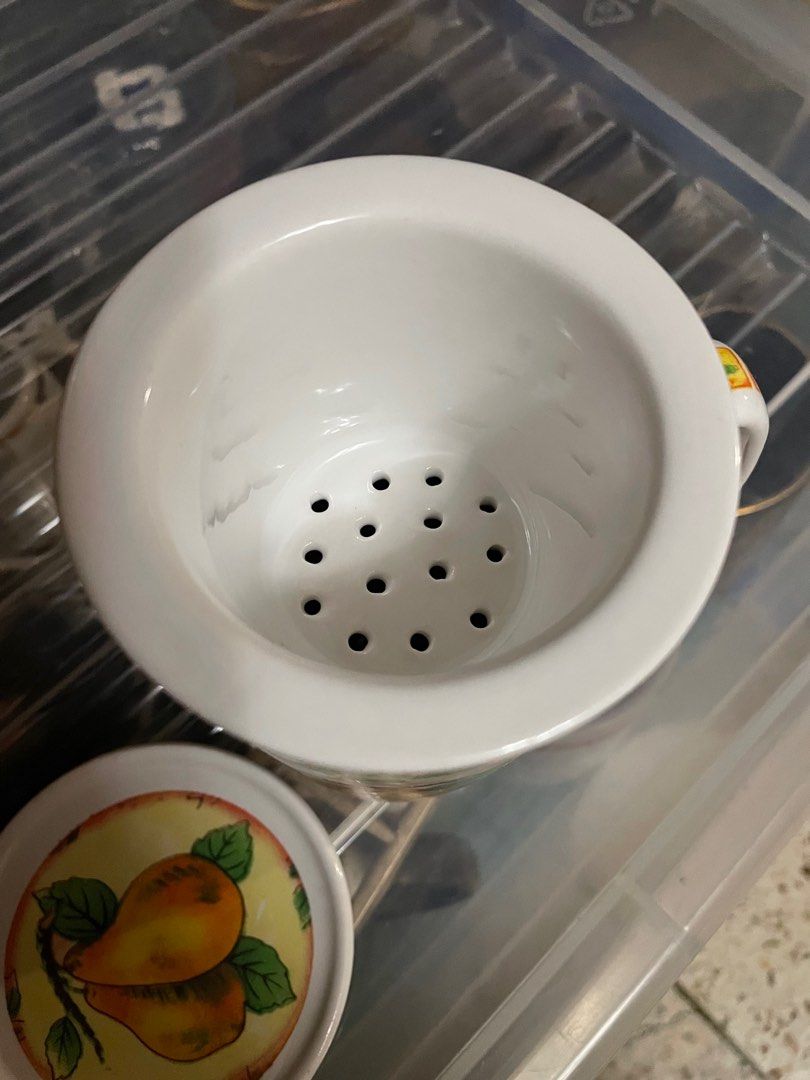 Mug with Tea Strainer and Cover (Category: Coffee & Tea Tableware) located in Quezon City. Submitted by kitchella.ph (Listing ID 1394730239, Image 2). Description: Mug with tea strainer and cover. All parts are made of ceramic. Brand new. Never used. As is where is. No box. Payment via BPI bank transfer. Pick-up in Quezon City (near GAC Motor Mindanao Avenue) via Grab, Lalamove, etc. Courier fee c/o buyer..