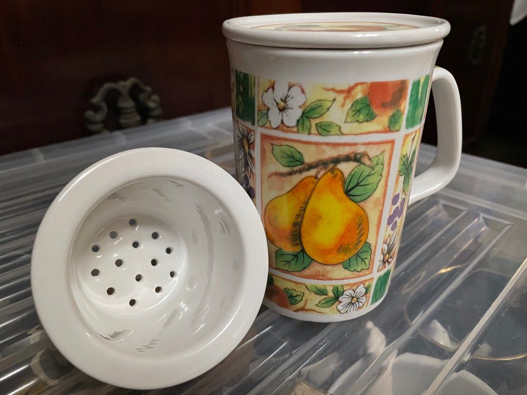 Mug with Tea Strainer and Cover (Category: Coffee & Tea Tableware) located in Quezon City. Submitted by kitchella.ph (Listing ID 1394730239, Image 1). Description: Mug with tea strainer and cover. All parts are made of ceramic. Brand new. Never used. As is where is. No box. Payment via BPI bank transfer. Pick-up in Quezon City (near GAC Motor Mindanao Avenue) via Grab, Lalamove, etc. Courier fee c/o buyer..