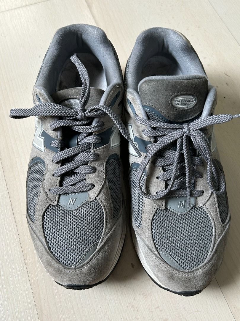 New Balance 2002R Grey Sneakers (Category: Sneakers) located in Manila. Submitted by decluttteringz (Listing ID 1394610650, Image 3). Description: - New Balance 2002R - Color: Grey - Size: US 9.5, UK 9, EUR 43 - Mesh upper with suede overlays - Lace-up closure - Cushioned midsole - New Balance logo detail.