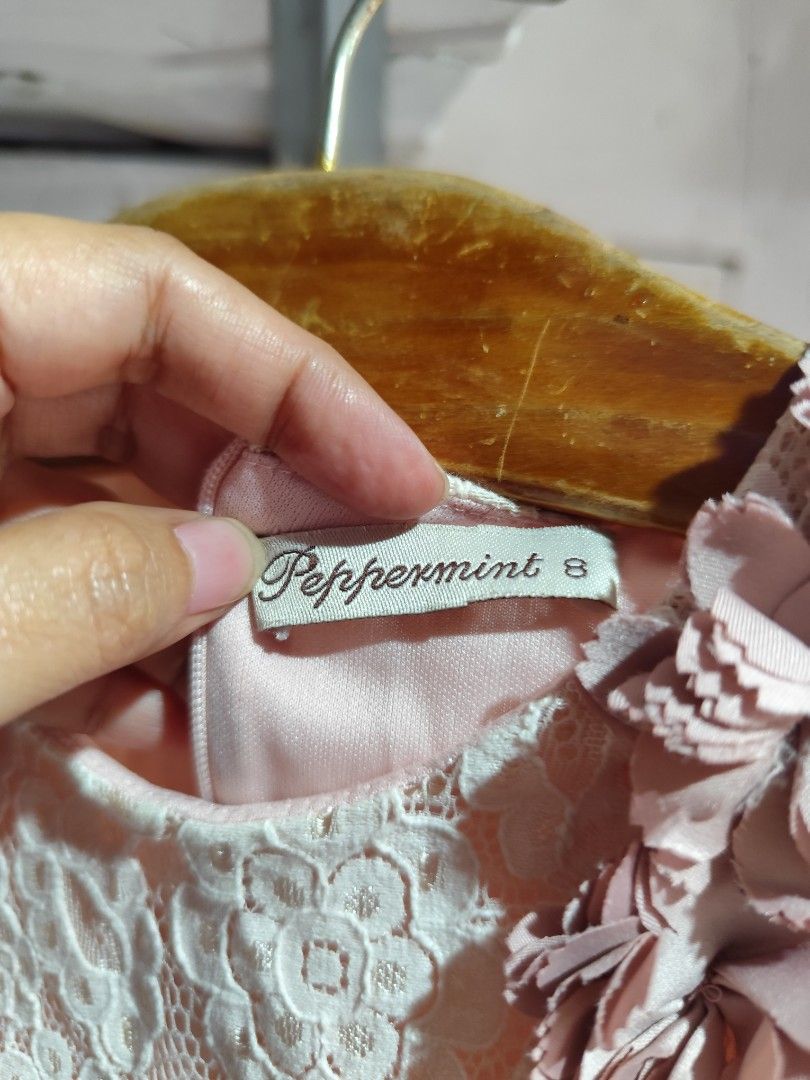 Peppermint Lace Dress - Size 8 (Category: Babies & Kids Fashion) located in Marikina City. Submitted by jesilync (Listing ID 1394624956, Image 3). Description: - Peppermint lace dress - Size 8 - Delicate floral lace in soft pink - Fitted bodice, flared skirt - Floral accents on shoulders - Perfect for special occasions or everyday wear.