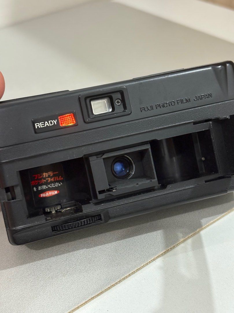 Pocket Fujica 450 Flash (Category: Cameras) located in Quezon. Submitted by georgieeeeee (Listing ID 1394608629, Image 3). Description: Selling my Pocket Fujica 450 Flash (price negotiable) Camera/flash works, viewfinder is clear. Issue: shots are a bit hit or miss I made a few modifications po to the camera to make it work (see third photo - I had to add metal clip inside to help the film advance). You'll have to pry the film cartridge out, pero