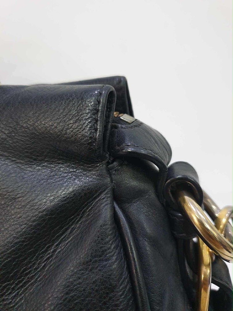 Prada Leather Bag (Category: Luxury Bags & Wallets) located in Quezon City. Submitted by roxycris (Listing ID 1394761475, Image 3). Description: Inclusions: - strap - dustbag Guaranteed authentic.