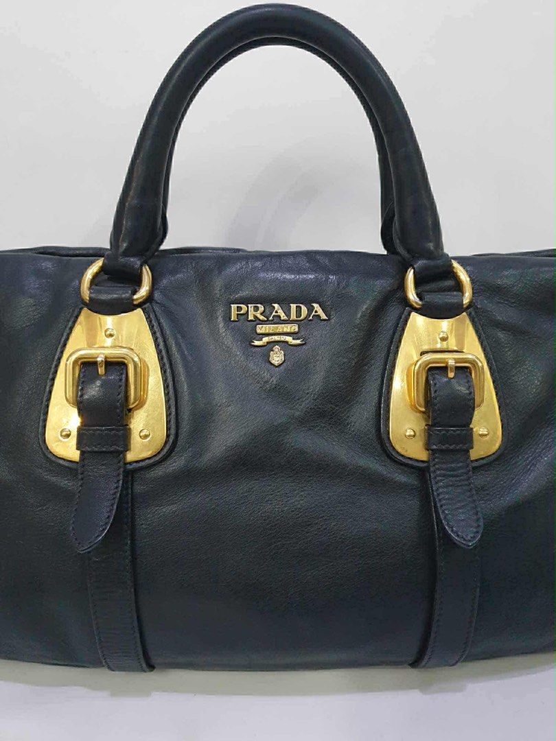 Prada Leather Bag (Category: Luxury Bags & Wallets) located in Quezon City. Submitted by roxycris (Listing ID 1394761475, Image 2). Description: Inclusions: - strap - dustbag Guaranteed authentic.