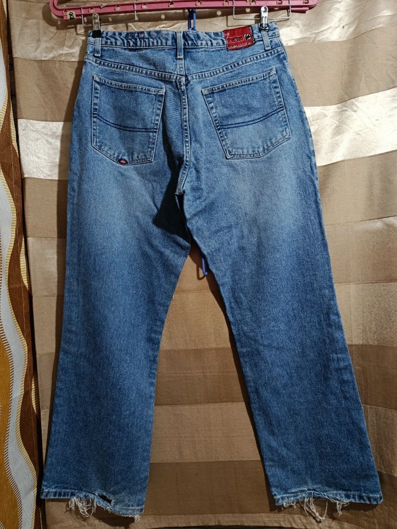 Quiksilver y2k Denim Jeans (Category: Jeans) located in Baguio. Submitted by xxrtabzxx185040 (Listing ID 1394763337, Image 2). Description: - Quiksilver denim jeans - Straight leg cut - Classic five-pocket design - Size 34 - Distressed hem - Red Quiksilver tag on back pocket.