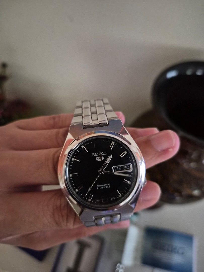 SEIKO 5 Automatic 7S26-01T0 in Silver Black Face (Category: Luxury Watches) located in San Fernando. Submitted by ms.mlsluxeboutique (Listing ID 1394679773, Image 3). Description: •100% authentic lor moneyback guarantee if proven fake. •Purchased at Prestige Store in SM City Pampanga •Case size: 35mm •Complete inclusions: Paperbag,box,extra links,manual and warranty card with guarantee certificate. •Worn few times only •No issue or damage.