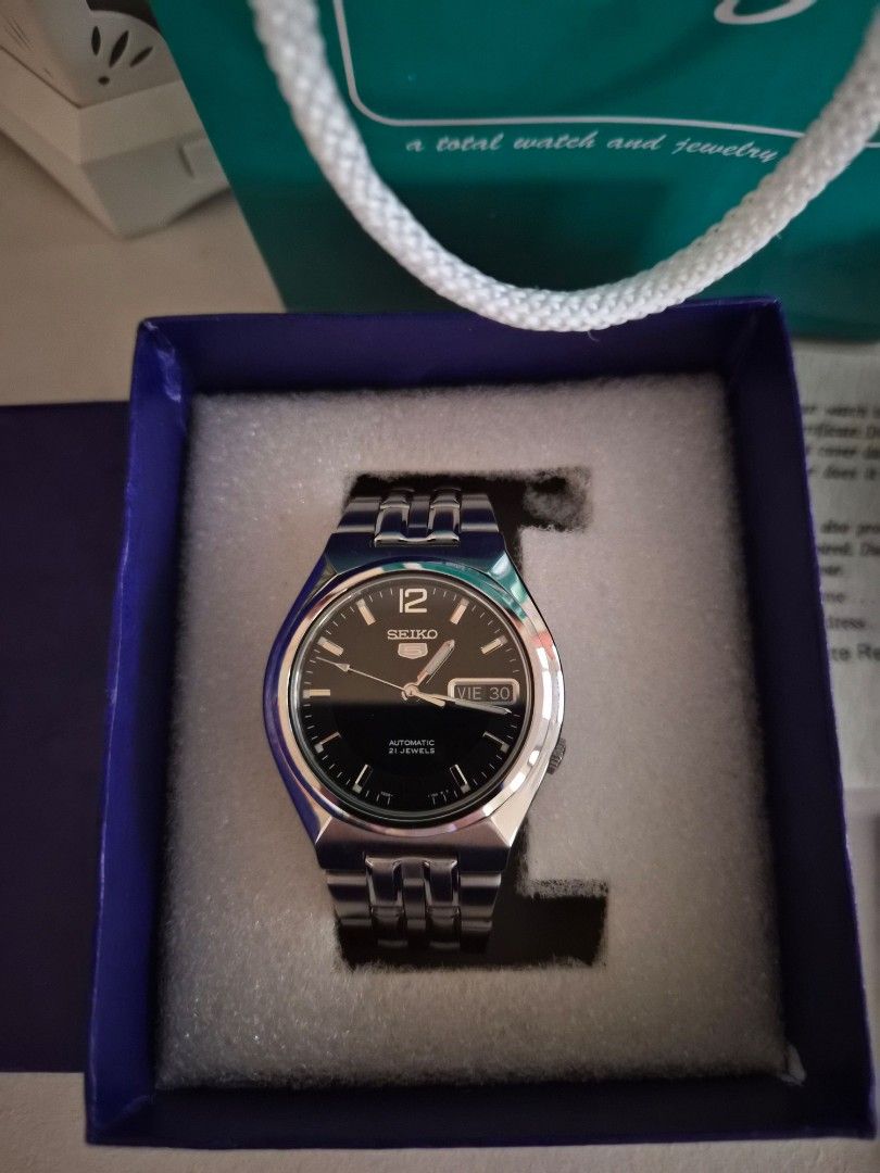 SEIKO 5 Automatic 7S26-01T0 in Silver Black Face (Category: Luxury Watches) located in San Fernando. Submitted by ms.mlsluxeboutique (Listing ID 1394679773, Image 2). Description: •100% authentic lor moneyback guarantee if proven fake. •Purchased at Prestige Store in SM City Pampanga •Case size: 35mm •Complete inclusions: Paperbag,box,extra links,manual and warranty card with guarantee certificate. •Worn few times only •No issue or damage.