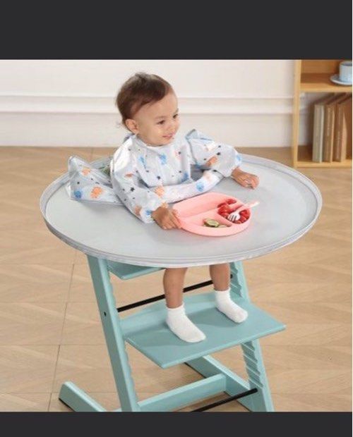 Stokke High Chair BLW baby led weaning Tray with Bib and Storage Bag (Category: Weaning & Toddler Feeding) located in Singapore. Submitted by bestversion11 (Listing ID 1394752047, Image 1). Description: Great to use when starting Baby Led weaning self feeding. To ensure the baby doesn’t drop all the food and allow them enough space to explore and get messy when eating. Have one gray tray with gray long sleeve bib and bag ($22) Baby dining table s