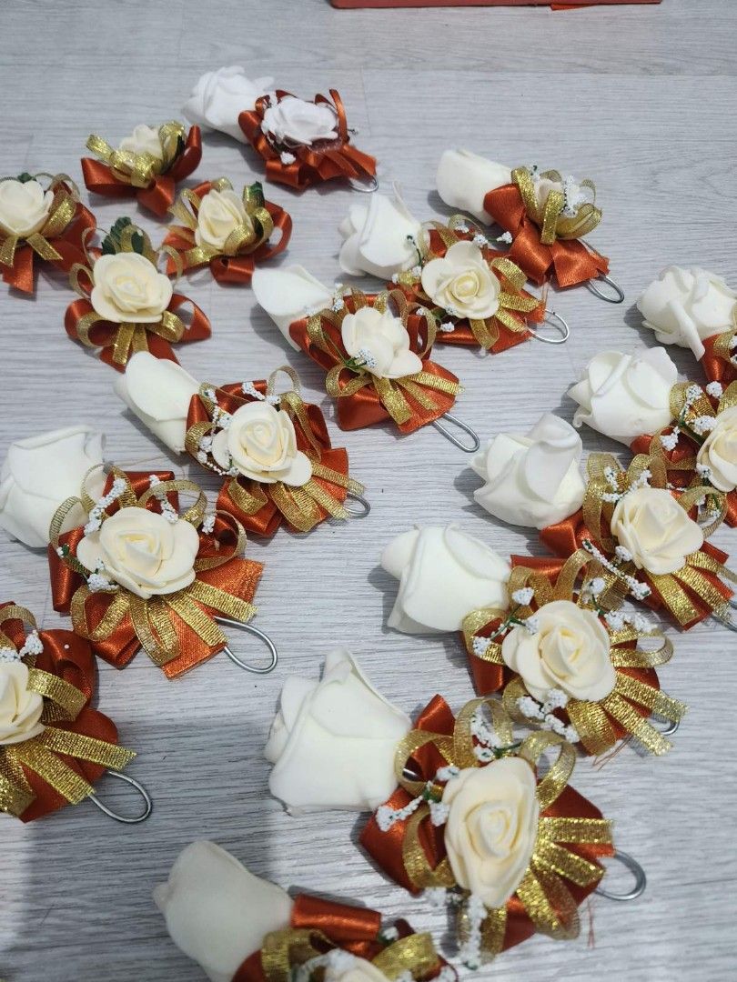 Wedding Boutonnieres/Chest Corsage (Category: Looking For) located in Manila. Submitted by jgprevoledmnl (Listing ID 1394669538, Image 2). Description: Color: Rustic Orange, Cream White Artificial Flowers 20 pcs.